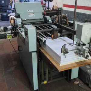 Dobradeira Titan 490A ano 2009 Formato de 660 x 480 mm Faz 4 dobras paralelas e 1 cruzada a 180 metros por minuto!