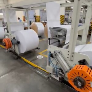 áquina de papel A4  3 bobinas 63. CM. Produz 400 cxs dia com 3 operadores